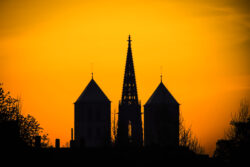 Sonnenaufgang über St. Lamberti Kirche und St.-Paulus-Dom von Anna Hünker